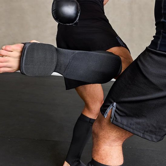 Protege tibia boxe